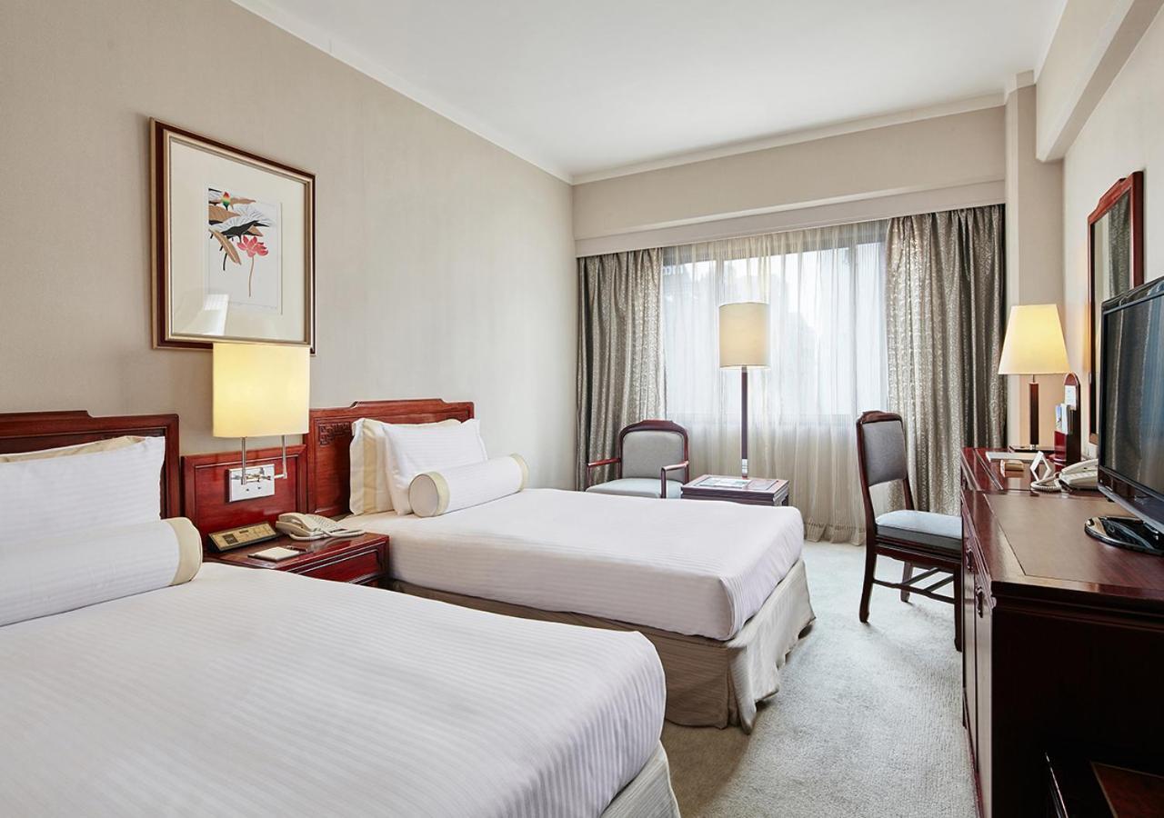 The Howard Plaza Hotel Taipé Quarto foto A room at the hotel